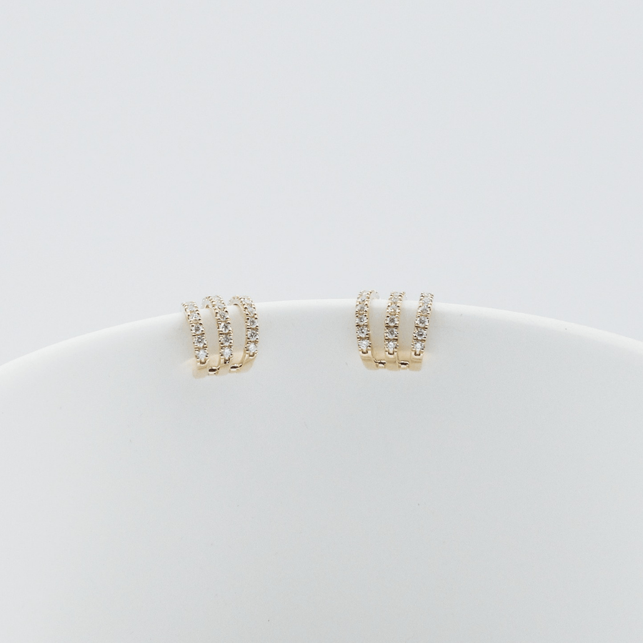 
                  
                    Tigris earrings with created diamonds
                  
                