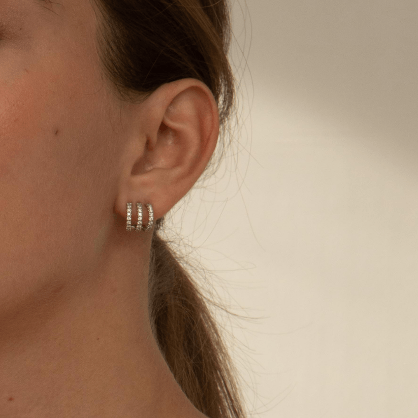 
                  
                    Tigris earrings with created diamonds
                  
                